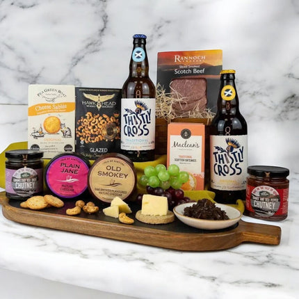 Thoughtful Scottish retirement hampers with whisky, cheese, shortbread, and artisan treats — hand-packed gifts to celebrate a well-earned next chapter with next-day UK delivery.