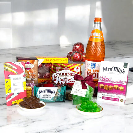 Corporate Christmas hampers for clients with Scottish cheese, chocolates, wine, and festive treats — luxury business gifts with branded options and UK-wide delivery.