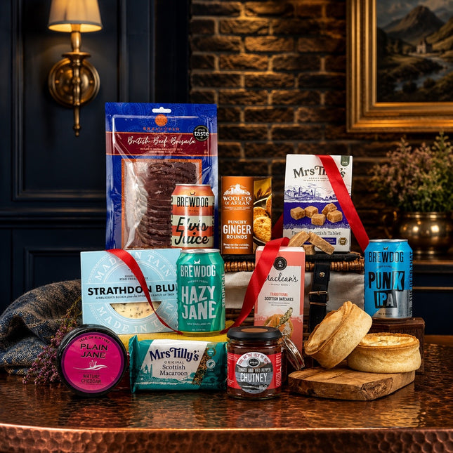 Assorted food and drink products on a wooden table with a decorative background.