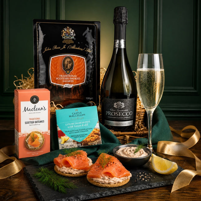 Gourmet gift basket with salmon, Prosecco, and other items on a wooden table.