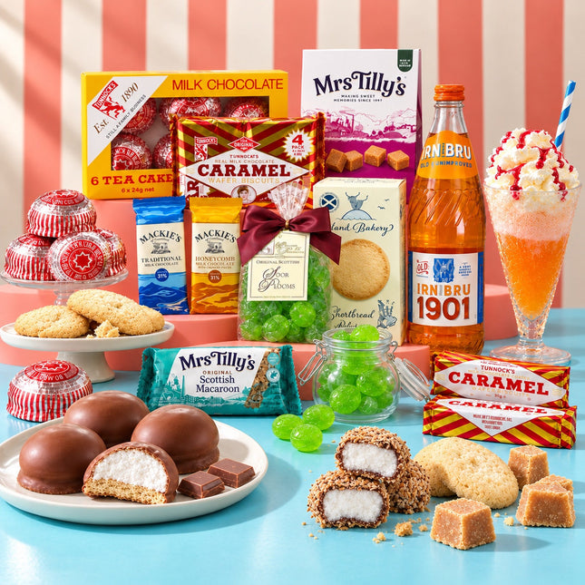 A colorful assortment of British treats and snacks arranged on a bright blue surface against pink-and-white striped paper. Visible products include Mrs.